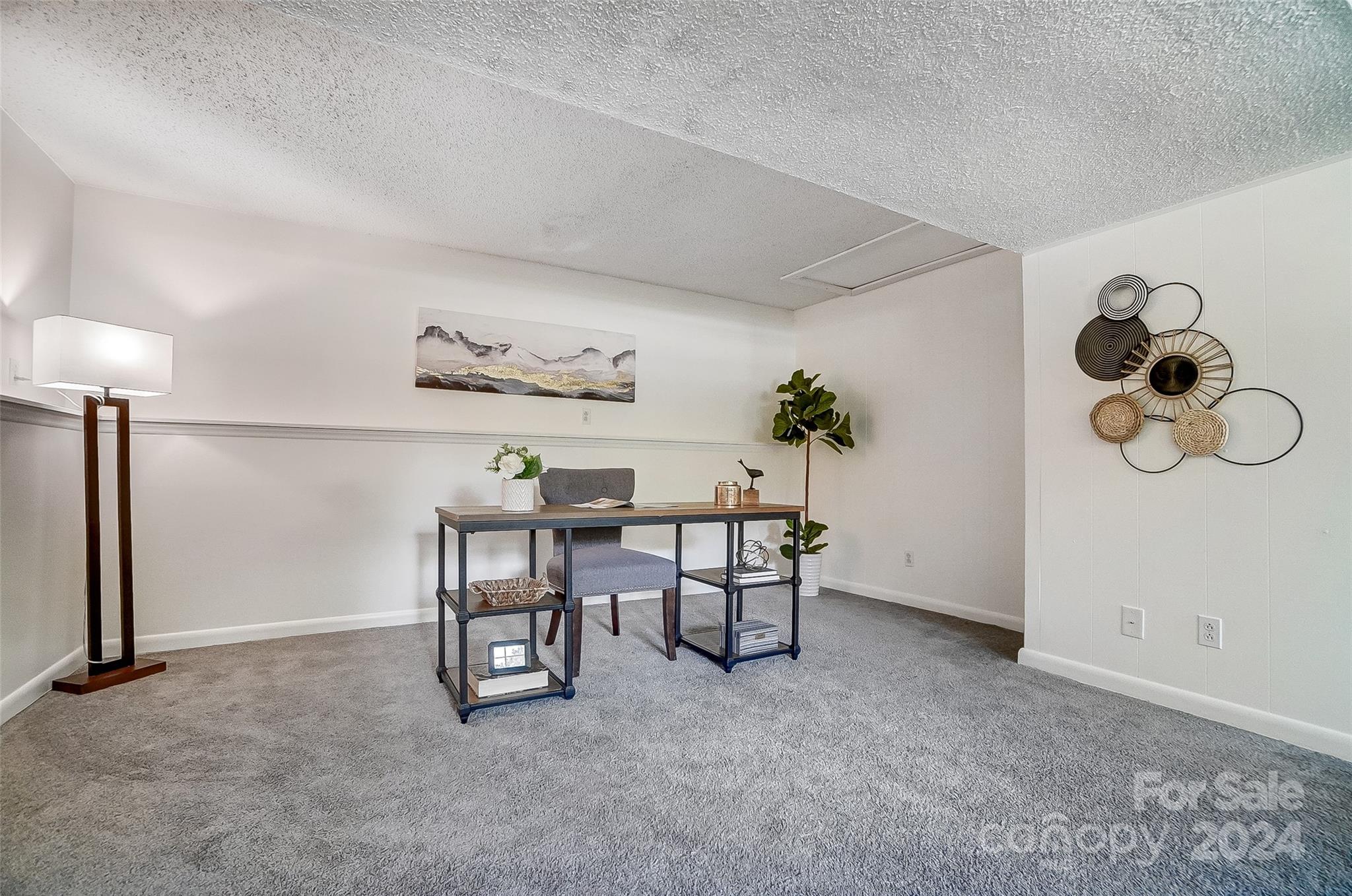 2236 Rice Planters Road Charlotte, NC 28273 - Photo 32 of 43 a view of a room with furniture and a chandelier fan