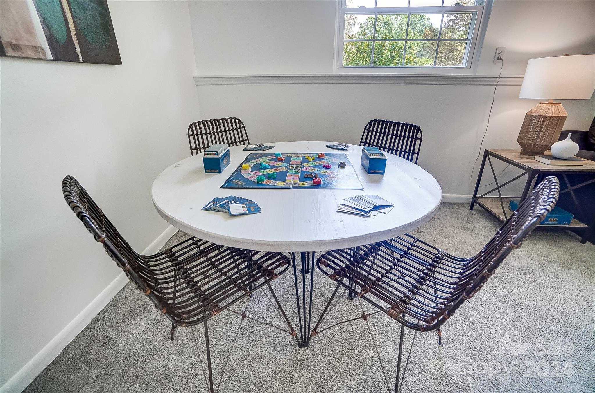 2236 Rice Planters Road Charlotte, NC 28273 - Photo 35 of 43 a view of a dining room with furniture and a window