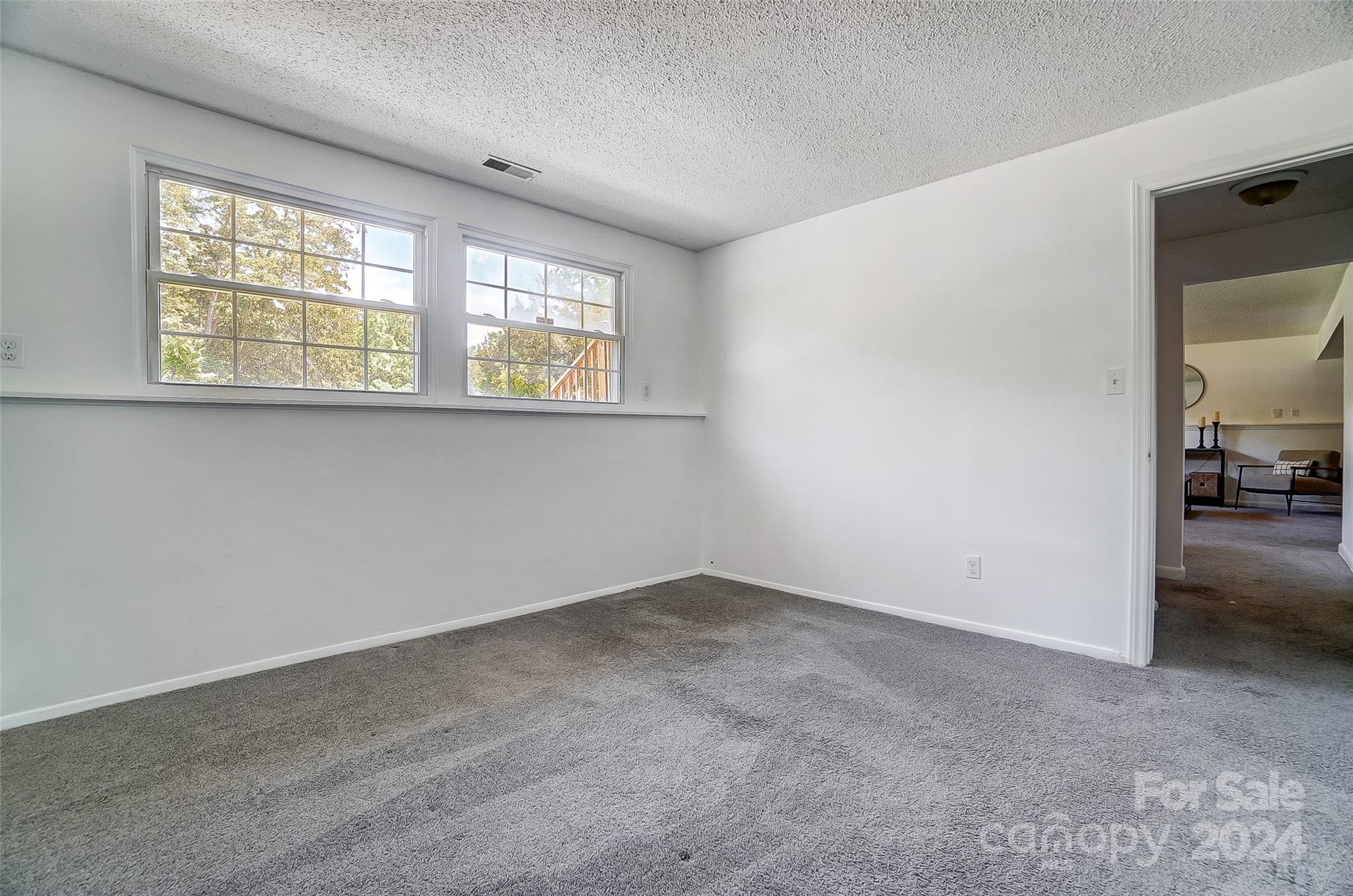 2236 Rice Planters Road Charlotte, NC 28273 - Photo 37 of 43 an empty room with a window