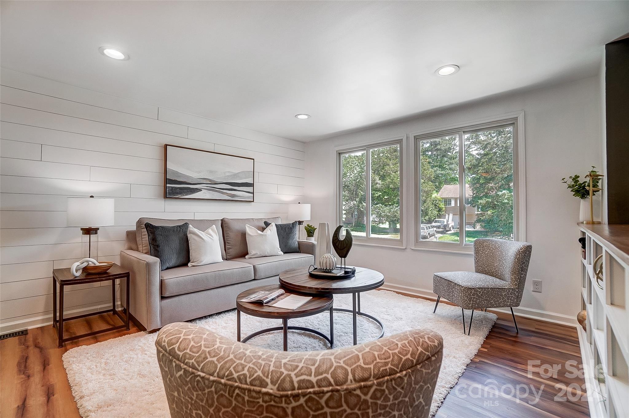 2236 Rice Planters Road Charlotte, NC 28273 - Photo 4 of 43 a living room with furniture and a large window