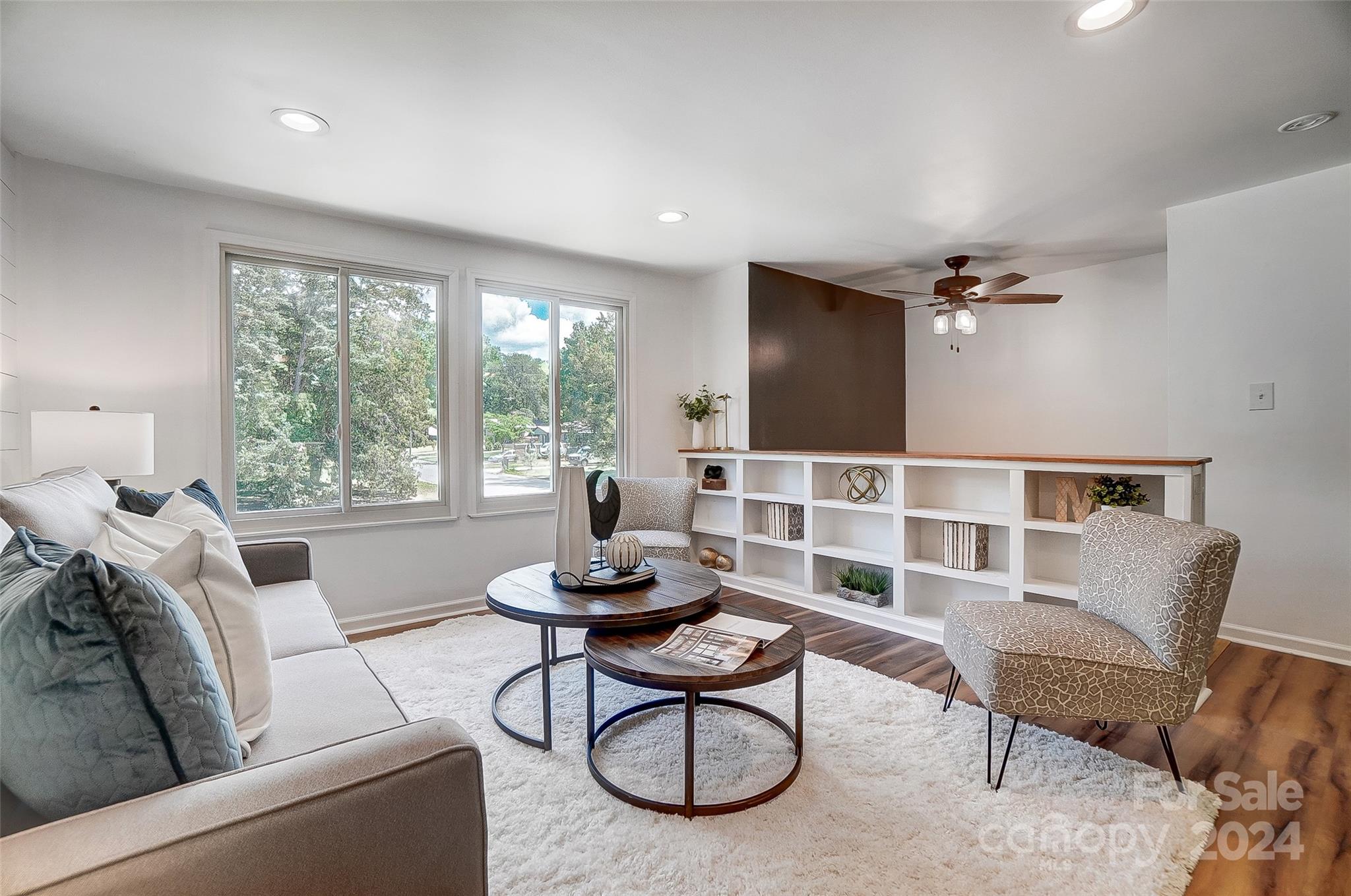 2236 Rice Planters Road Charlotte, NC 28273 - Photo 5 of 43 a living room with furniture and a large window