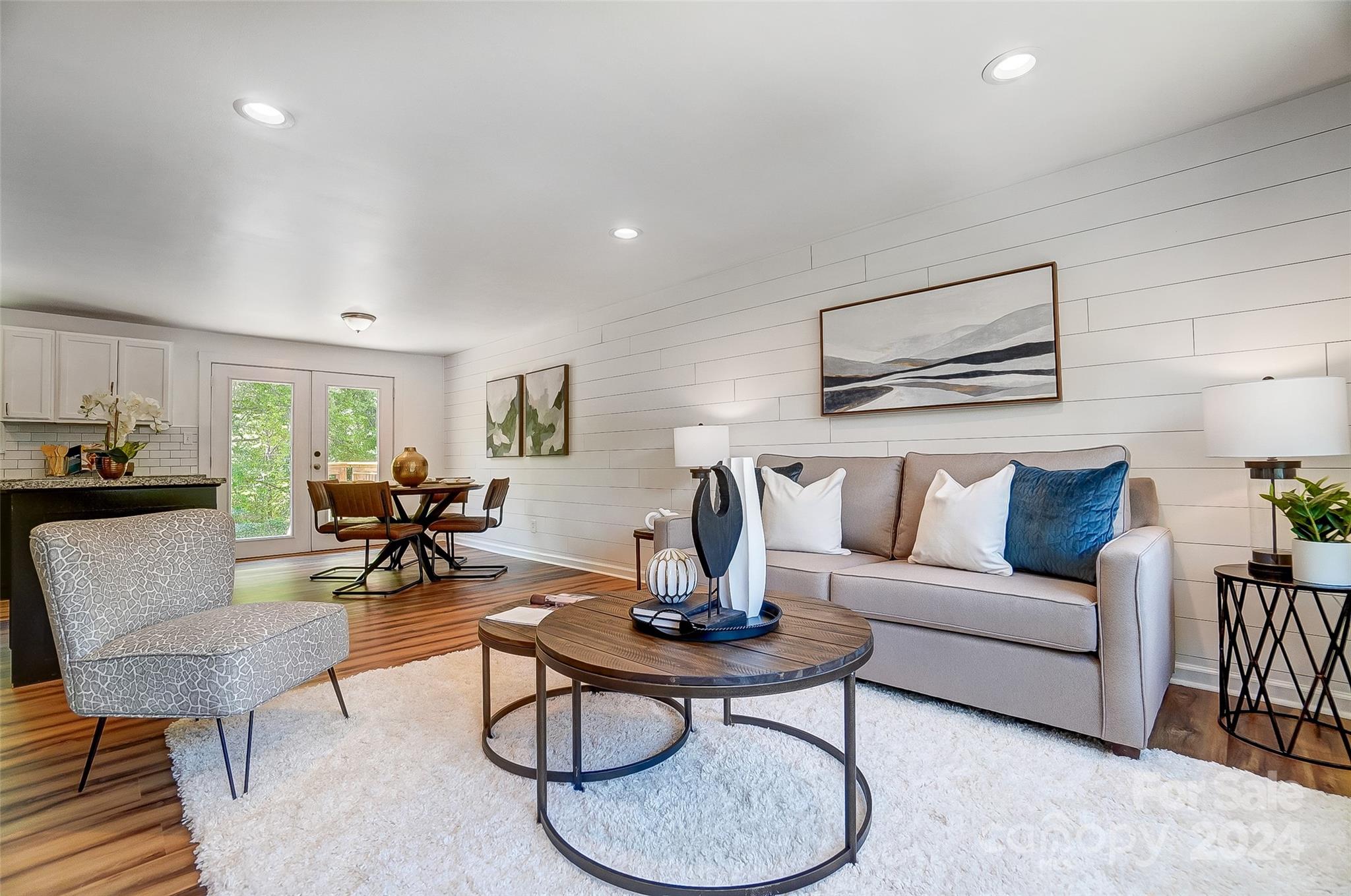 2236 Rice Planters Road Charlotte, NC 28273 - Photo 6 of 43 a living room with furniture and wooden floor