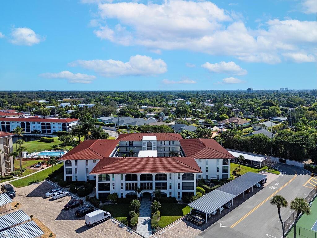 53 High Point Circle West, Unit 101 Naples, FL 34103 - Photo 14 of 18 a view of a city from the terrace