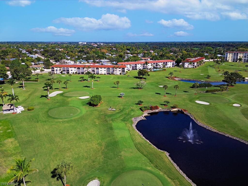 53 High Point Circle West, Unit 101 Naples, FL 34103 - Photo 17 of 18 a view of a city