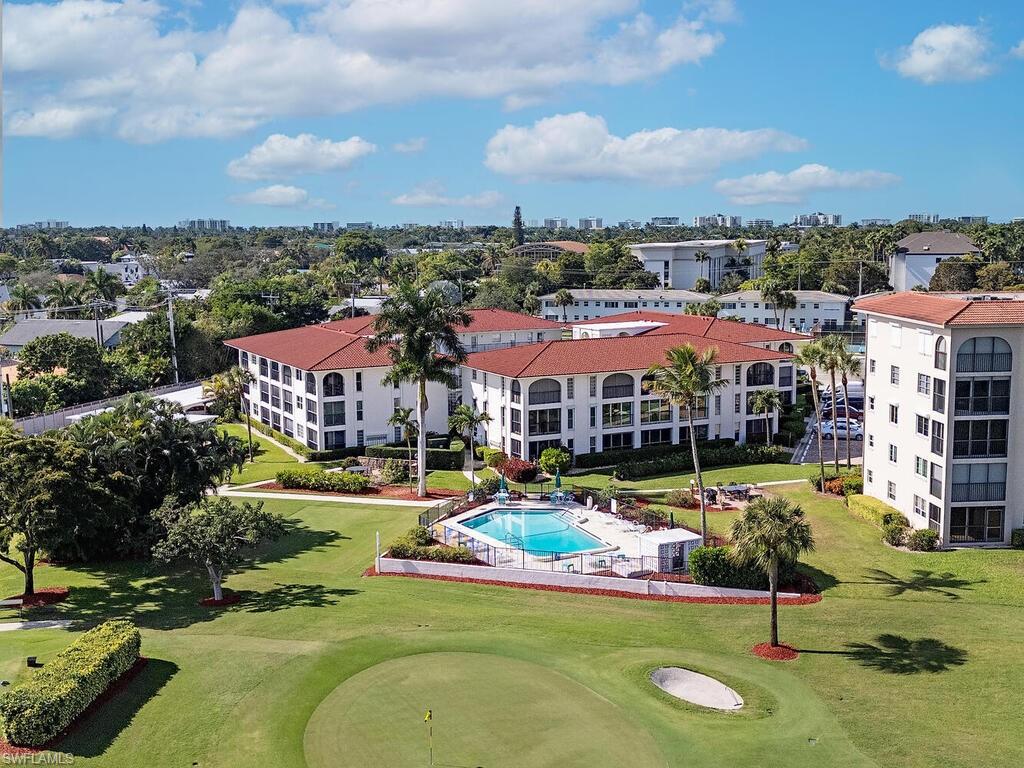 53 High Point Circle West, Unit 101 Naples, FL 34103 - Photo 18 of 18 a view of a city