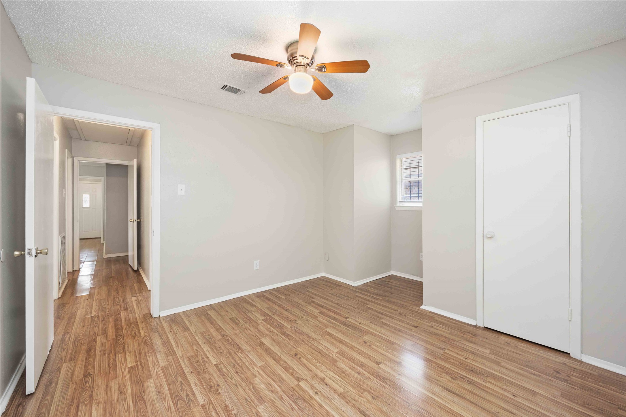 11750 Murr Way Houston, TX 77048 - Photo 20 of 23 a view of empty room with wooden floor