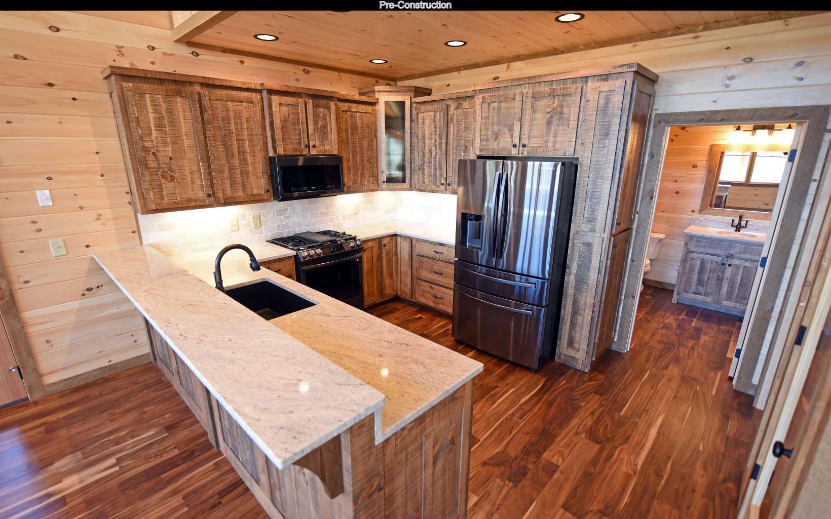 Lot11 Lot11 Native Trail Blue Ridge, GA 30513 - Photo 14 of 44 a kitchen with stainless steel appliances granite countertop a refrigerator a stove and a wooden floors