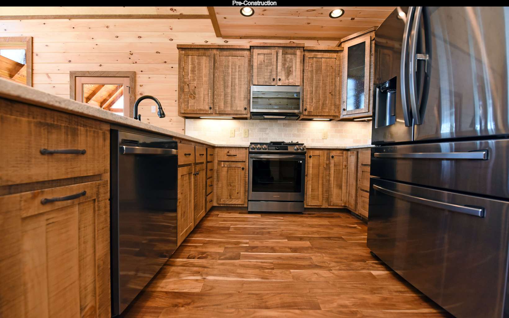 Lot11 Lot11 Native Trail Blue Ridge, GA 30513 - Photo 15 of 44 a kitchen with stainless steel appliances granite countertop a refrigerator and a stove top oven