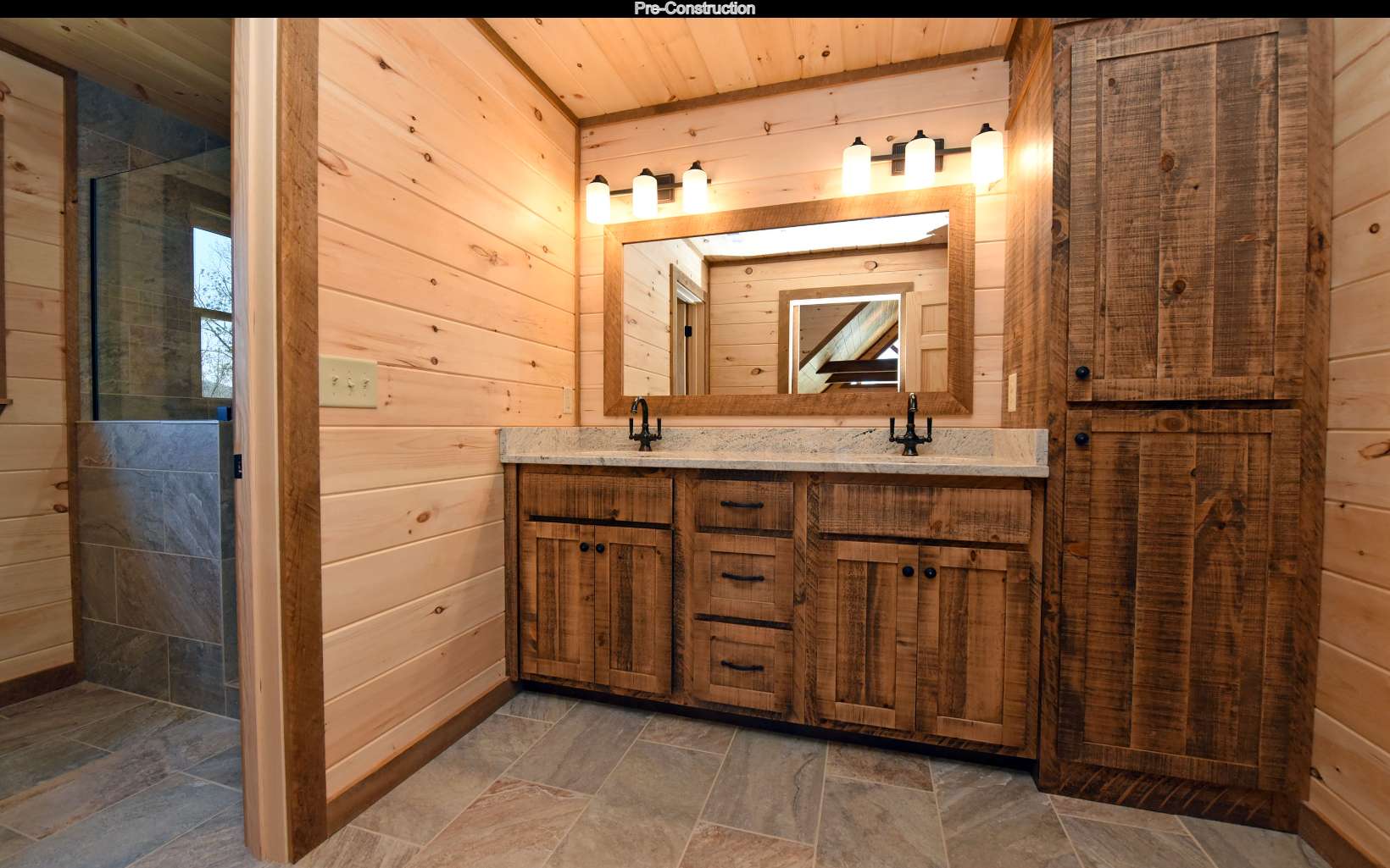 Lot11 Lot11 Native Trail Blue Ridge, GA 30513 - Photo 29 of 44 a bathroom with a granite countertop sink a mirror and a shower