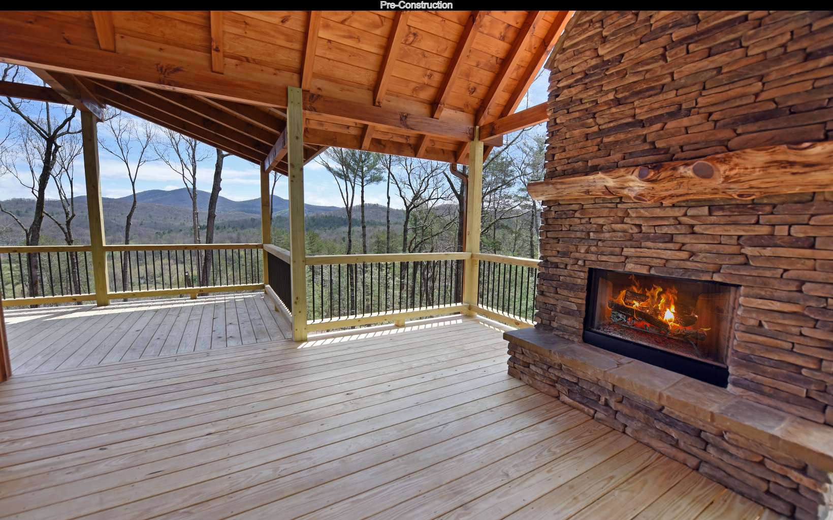 Lot11 Lot11 Native Trail Blue Ridge, GA 30513 - Photo 6 of 44 a view of empty room with wooden floor and fireplace