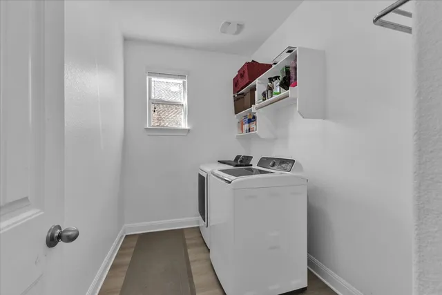 a utility room with dryer and washer