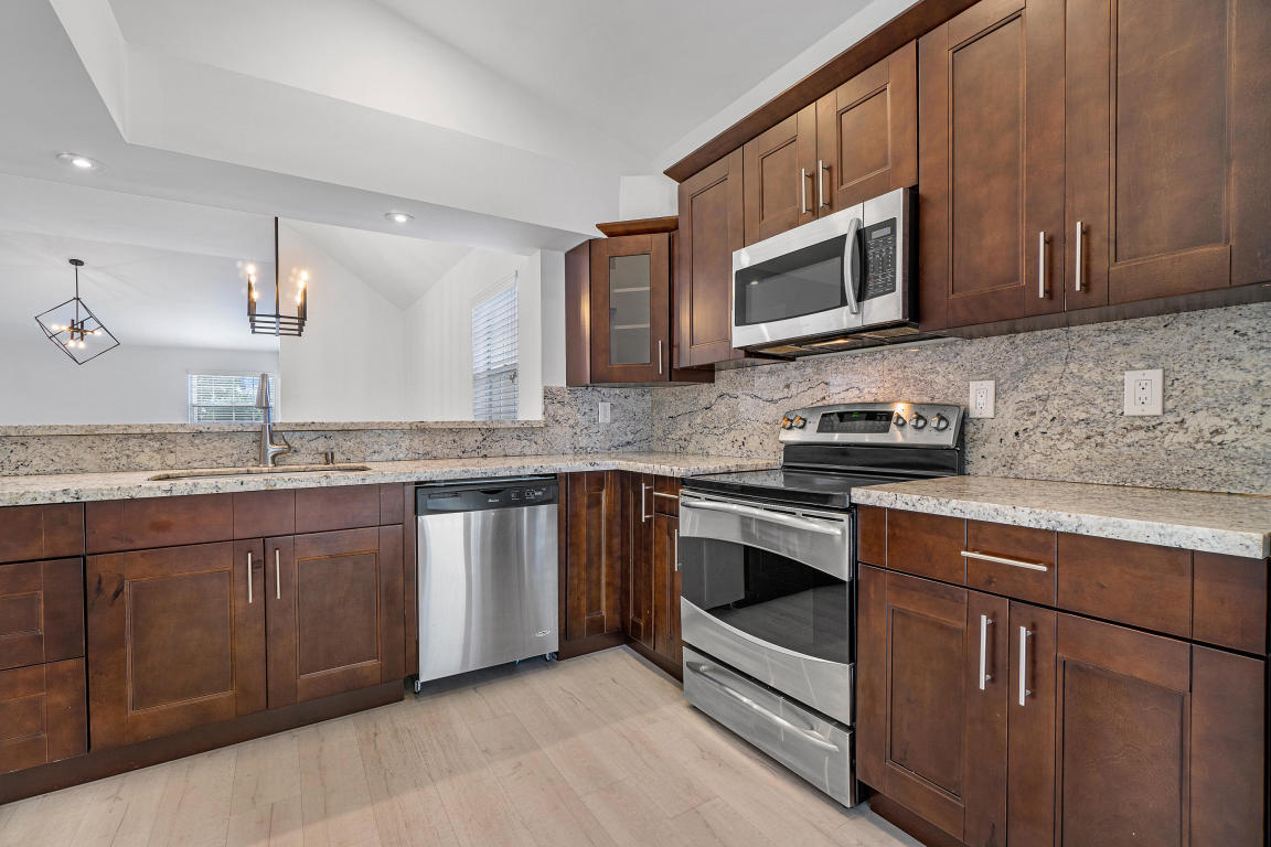 5328 Buckhead Circle, Unit 2020 Boca Raton, FL 33486 - Photo 15 of 30 Kitchen to Main Rooms