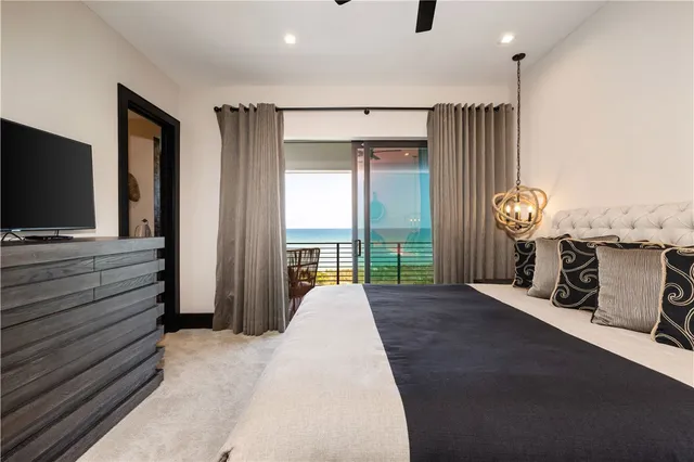 a bed room with a bed and a window