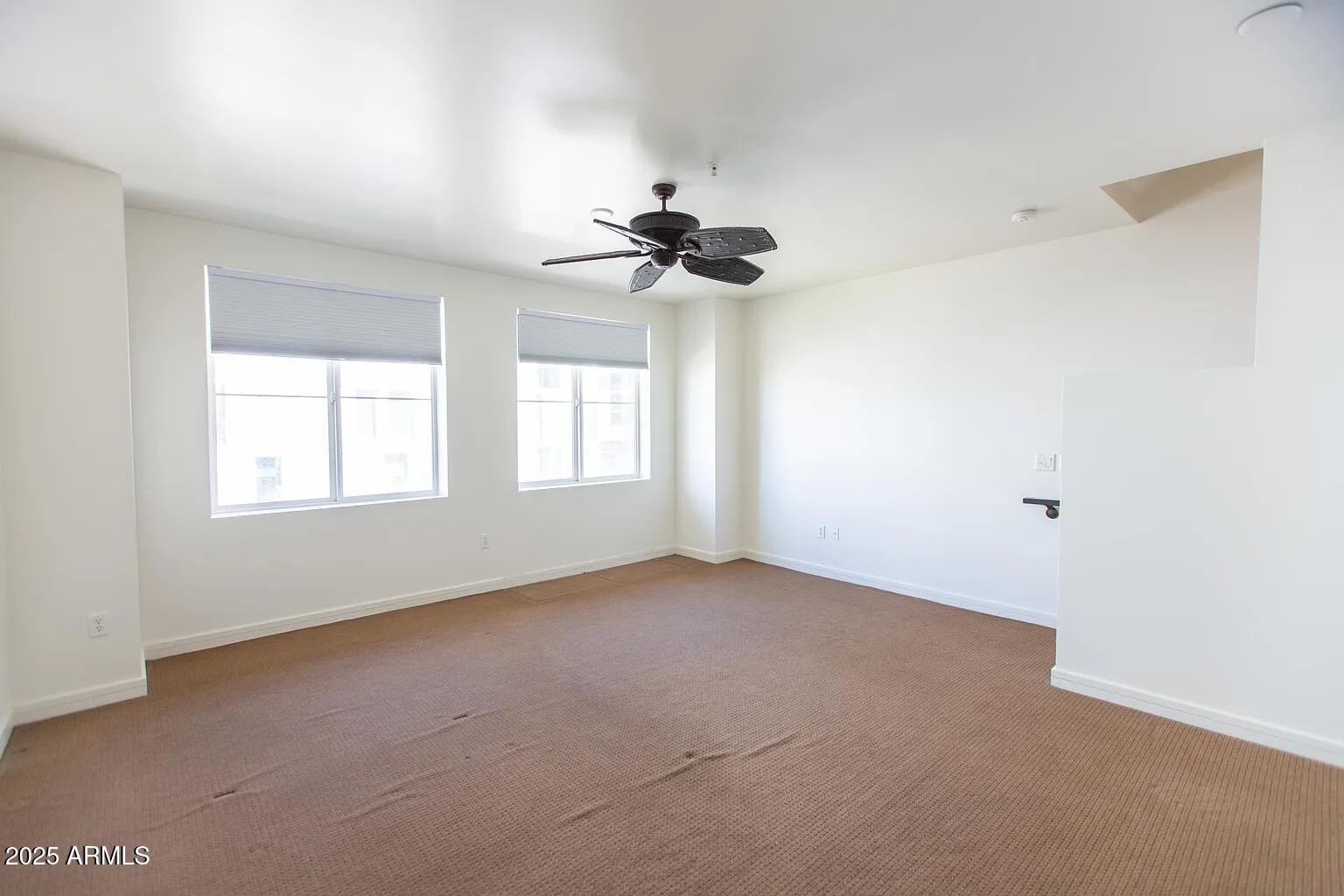 215 East McKinley Street, Unit 408 Phoenix, AZ 85004 - Photo 13 of 19 a view of an empty room with a window