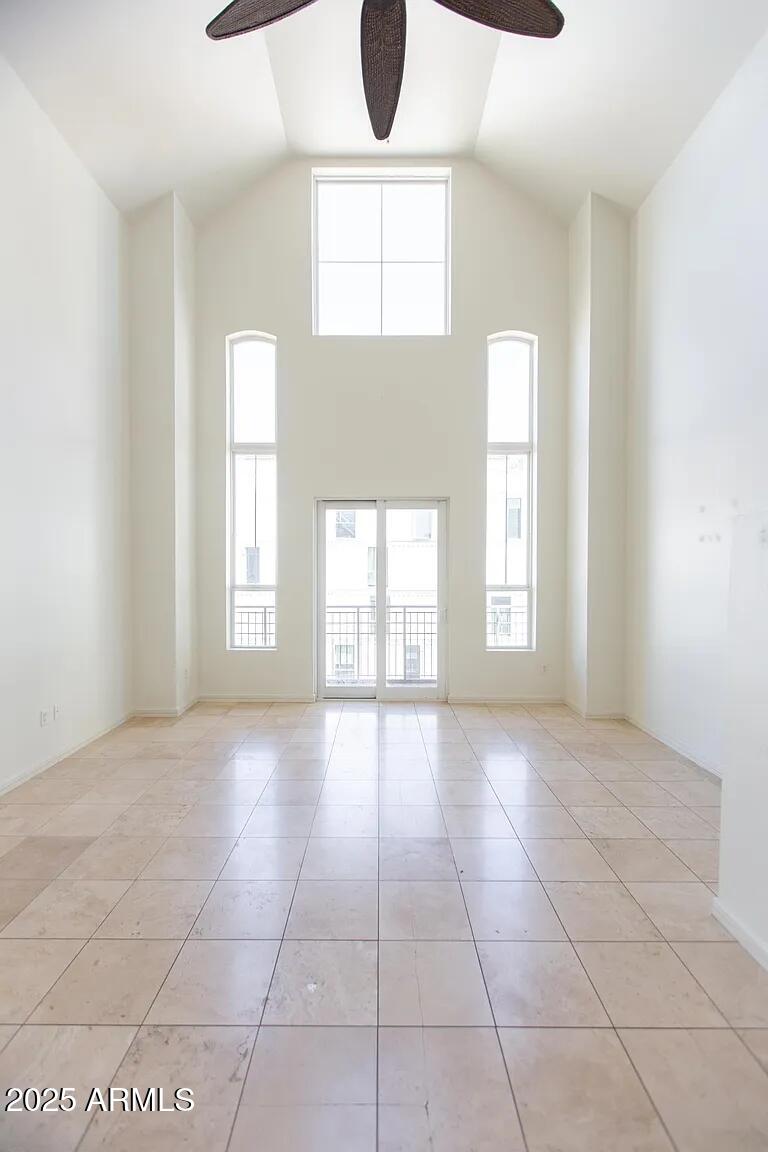 215 East McKinley Street, Unit 408 Phoenix, AZ 85004 - Photo 2 of 19 a view of an empty room with a window