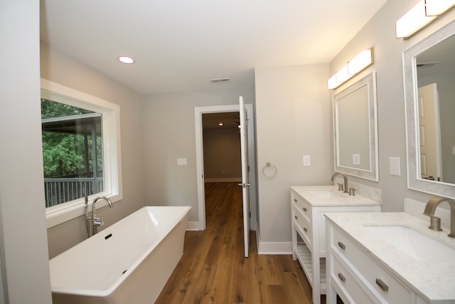 317 Pendleton Road Clemson, SC 29631 - Photo 24 of 36 Indulge in a tranquil primary bathroom oasis featuring a deep soaking tub and twin vanities.