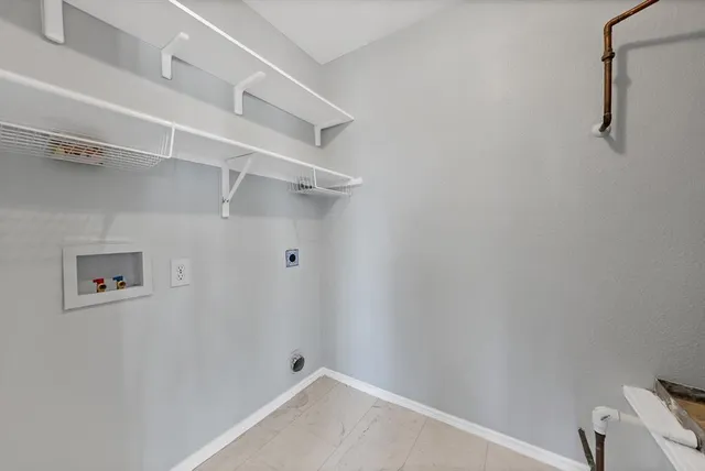 a view of a room with racks on the wall