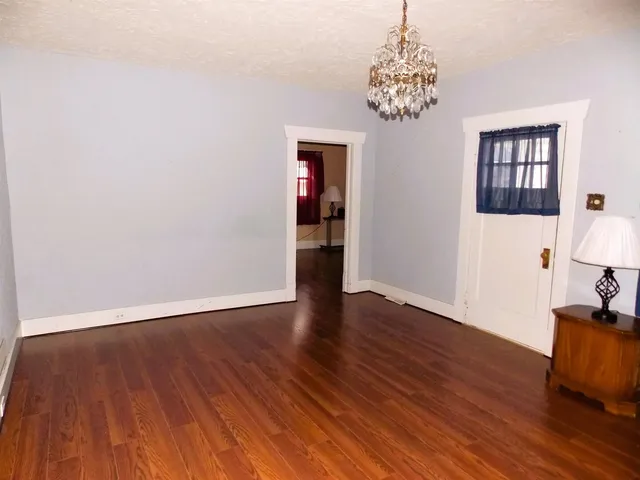 a bathroom with a shower and a toilet