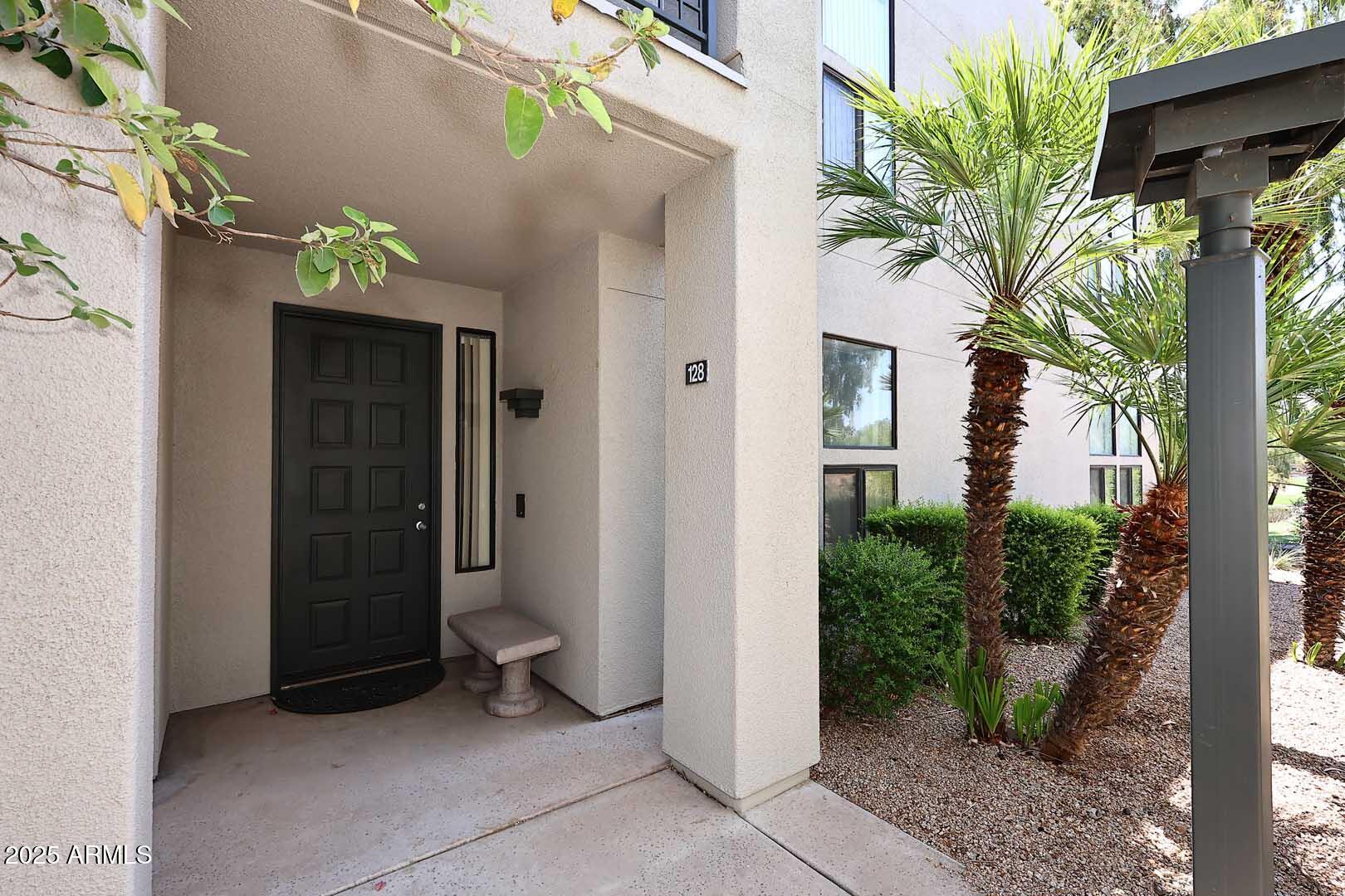 7700 East Gainey Ranch Road, Unit 128 Scottsdale, AZ 85258 - Photo 3 of 60 a view of a pathway of a house