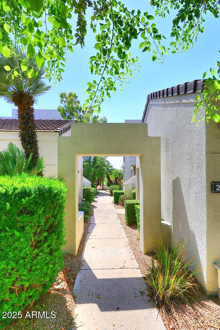 7700 East Gainey Ranch Road, Unit 128 Scottsdale, AZ 85258 - Photo 44 of 60 Walkway to Home