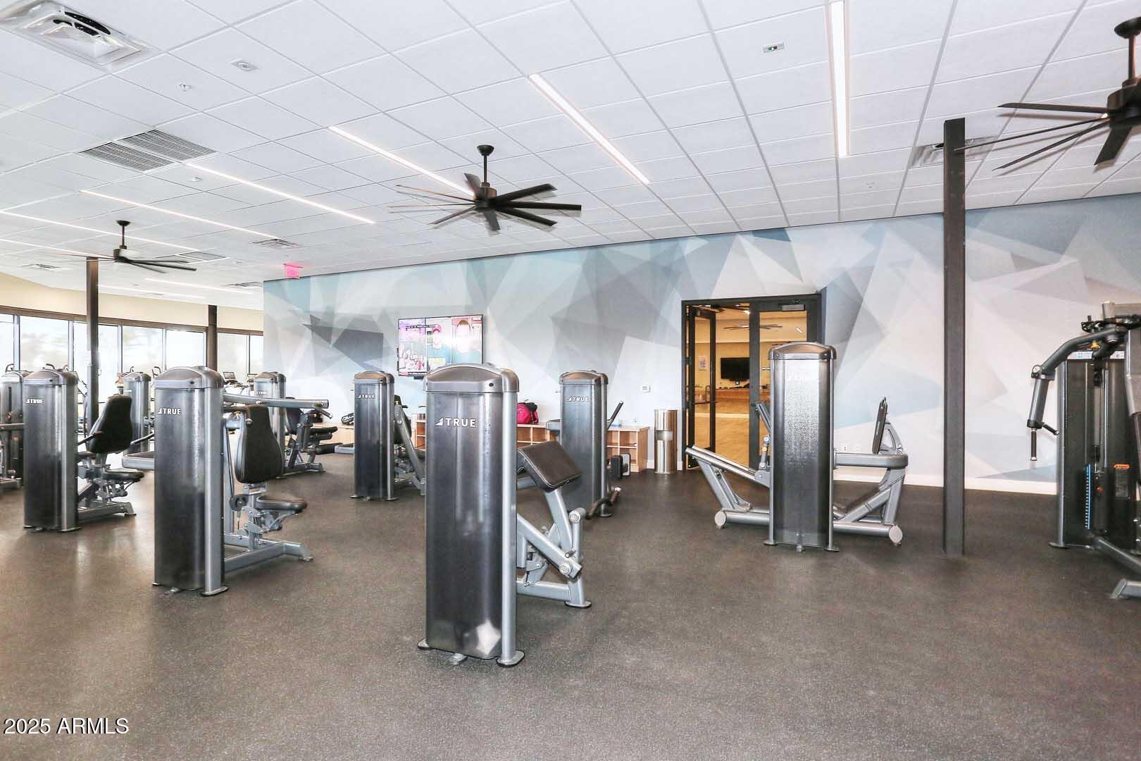 7700 East Gainey Ranch Road, Unit 128 Scottsdale, AZ 85258 - Photo 56 of 60 a view of a room with gym equipment