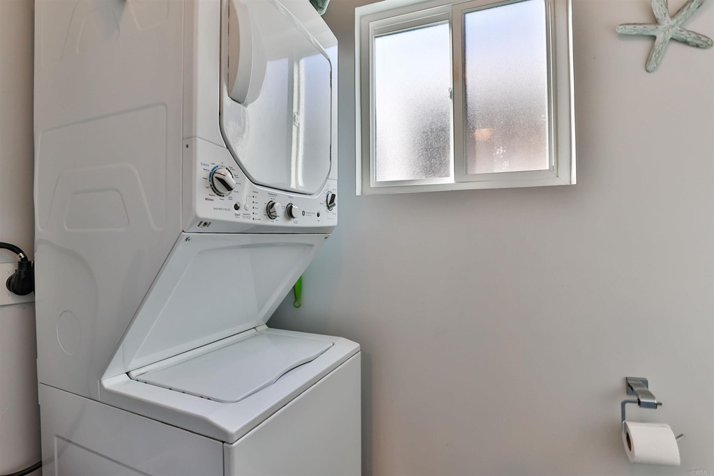 1116 Third Street Coronado, CA 92118 - Photo 12 of 33 a bathroom with a sink and a mirror