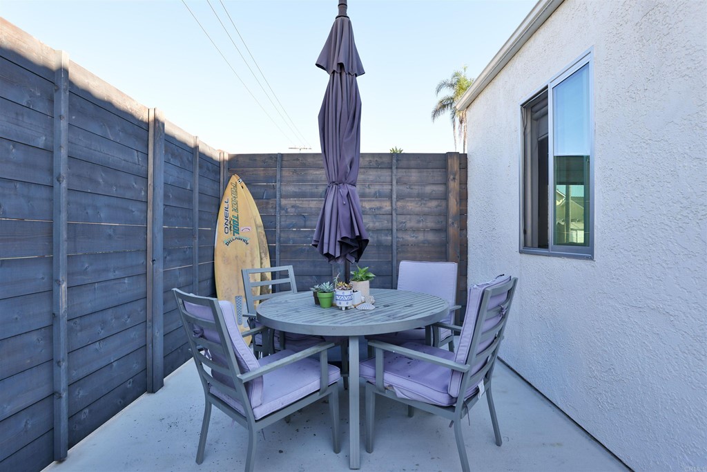 1116 Third Street Coronado, CA 92118 - Photo 19 of 33 a view of an outside dining space with furniture