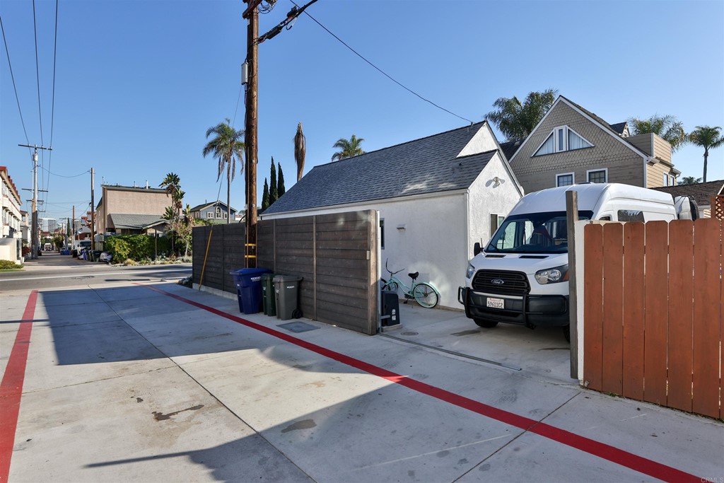 1116 Third Street Coronado, CA 92118 - Photo 31 of 33 a view of a car park in front of house