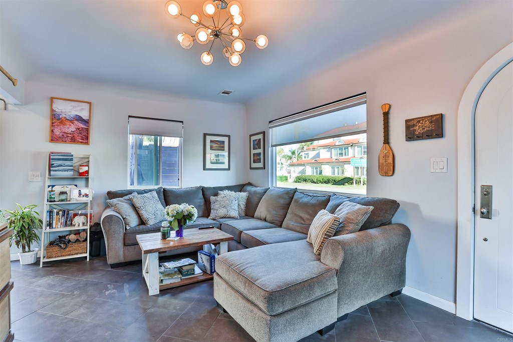 1116 Third Street Coronado, CA 92118 - Photo 4 of 33 a living room with furniture and a large window