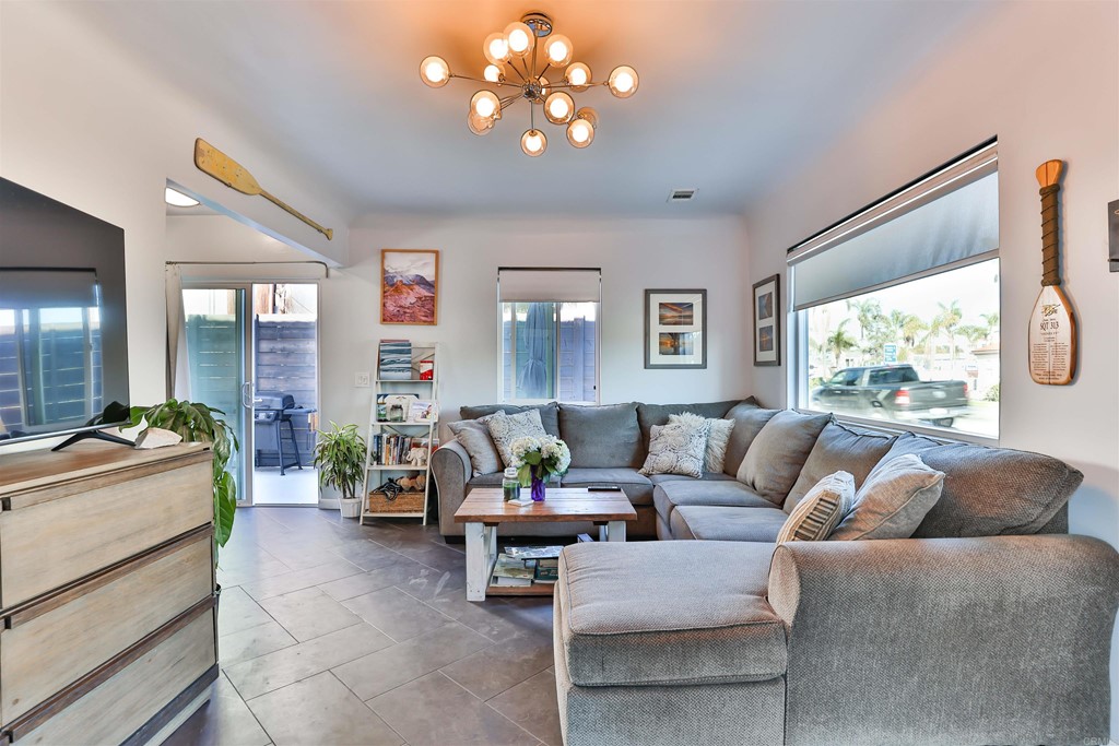 1116 Third Street Coronado, CA 92118 - Photo 5 of 33 a living room with furniture and a large window