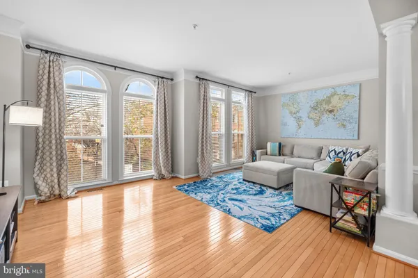 a bedroom with a bed and a table in it