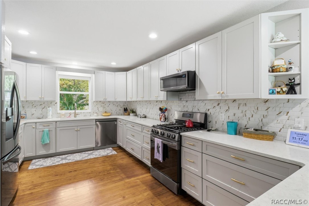 4099 West Ridge Court Dunnellon, FL 34433 - Photo 18 of 49 Another view of Fabulous kitchen. Endless drawers, cabinets and counter space . You'll enjoy spending time in this space. Dream kitchen for entertaining or just family life?