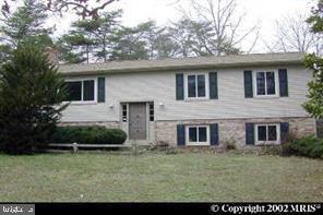 8026 Burwell Road Catlett, VA 20119 - Photo 1 of 1 Charming split-level home with greenery.