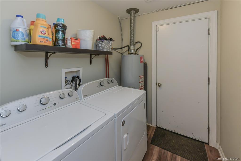 1239 Log Cabin Road Charlotte, NC 28213 - Photo 19 of 26 a utility room with dryer and washer