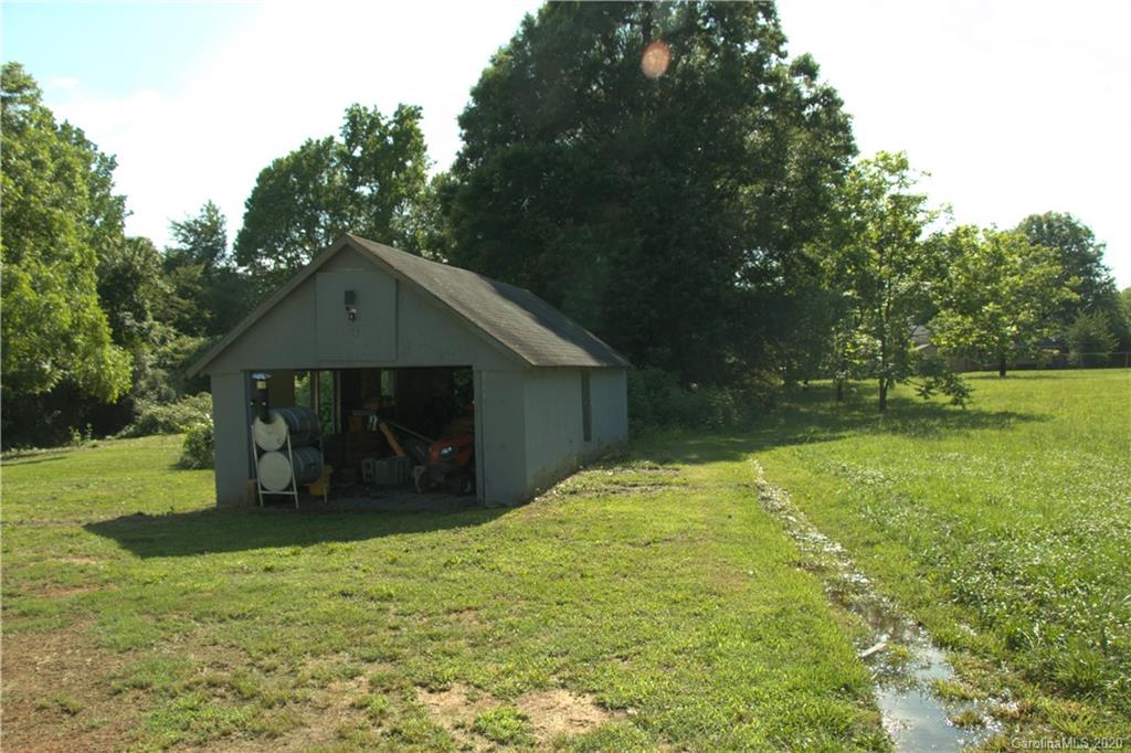 1239 Log Cabin Road Charlotte, NC 28213 - Photo 21 of 26 a house view with a outdoor space