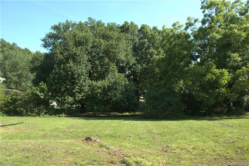 1239 Log Cabin Road Charlotte, NC 28213 - Photo 24 of 26 a view of outdoor space with deck and yard