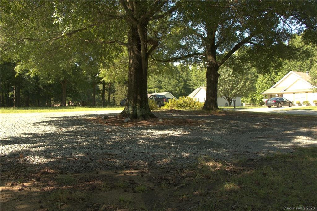 1239 Log Cabin Road Charlotte, NC 28213 - Photo 25 of 26 a view of outdoor space with trees