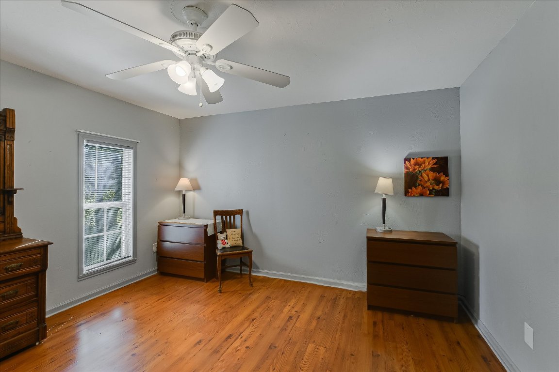 1001 Indian Springs Road Georgetown, TX 78633 - Photo 21 of 30 a view of a workspace with furniture and a window