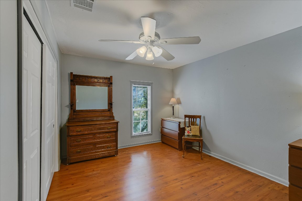 1001 Indian Springs Road Georgetown, TX 78633 - Photo 22 of 30 wooden floor in an empty room with a window