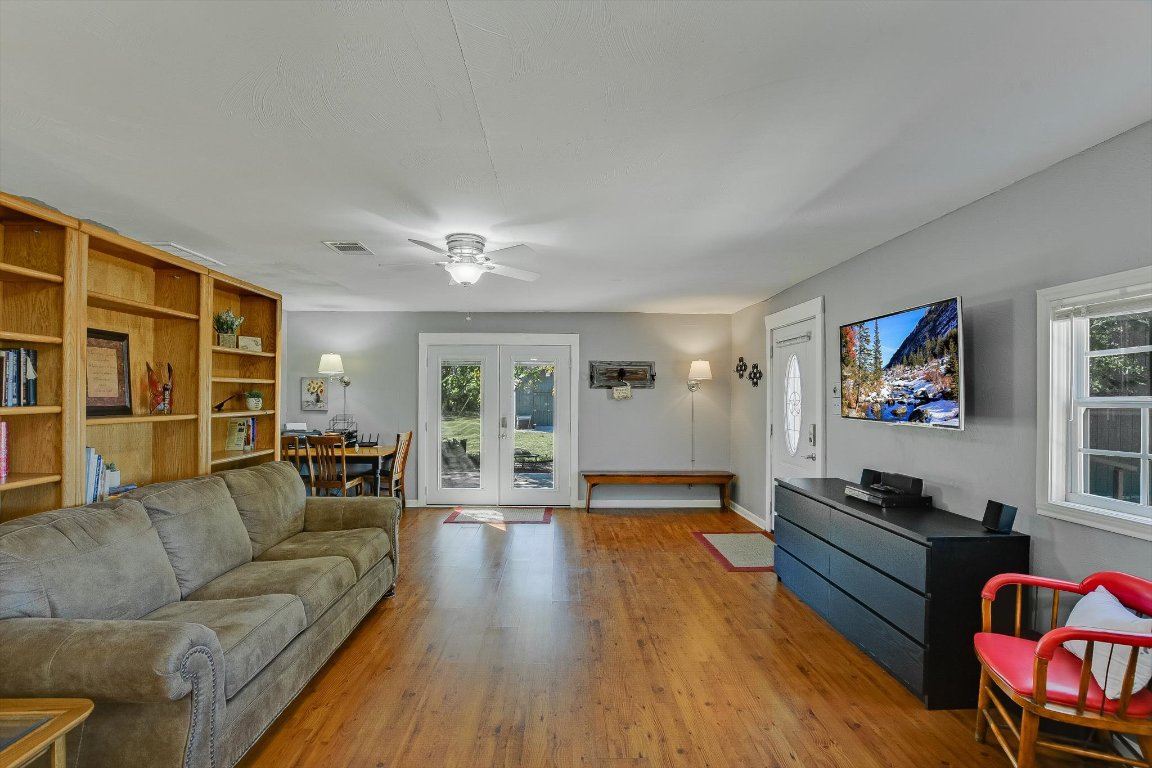 1001 Indian Springs Road Georgetown, TX 78633 - Photo 8 of 30 a living room with furniture and a flat screen tv