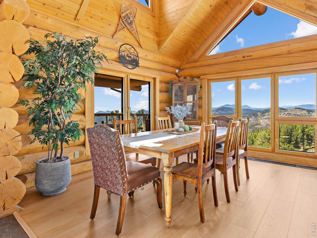 1398 Gold Lake Road Ward, CO 80481 - Photo 14 of 39 a patio with table and chairs and potted plants