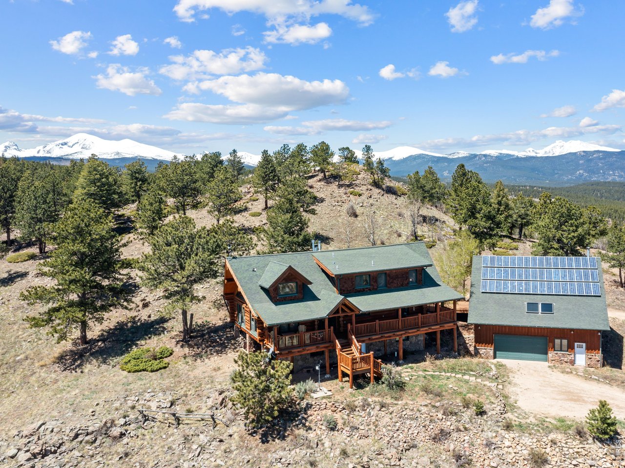 1398 Gold Lake Road Ward, CO 80481 - Photo 2 of 39 an aerial view of a houses with a yard