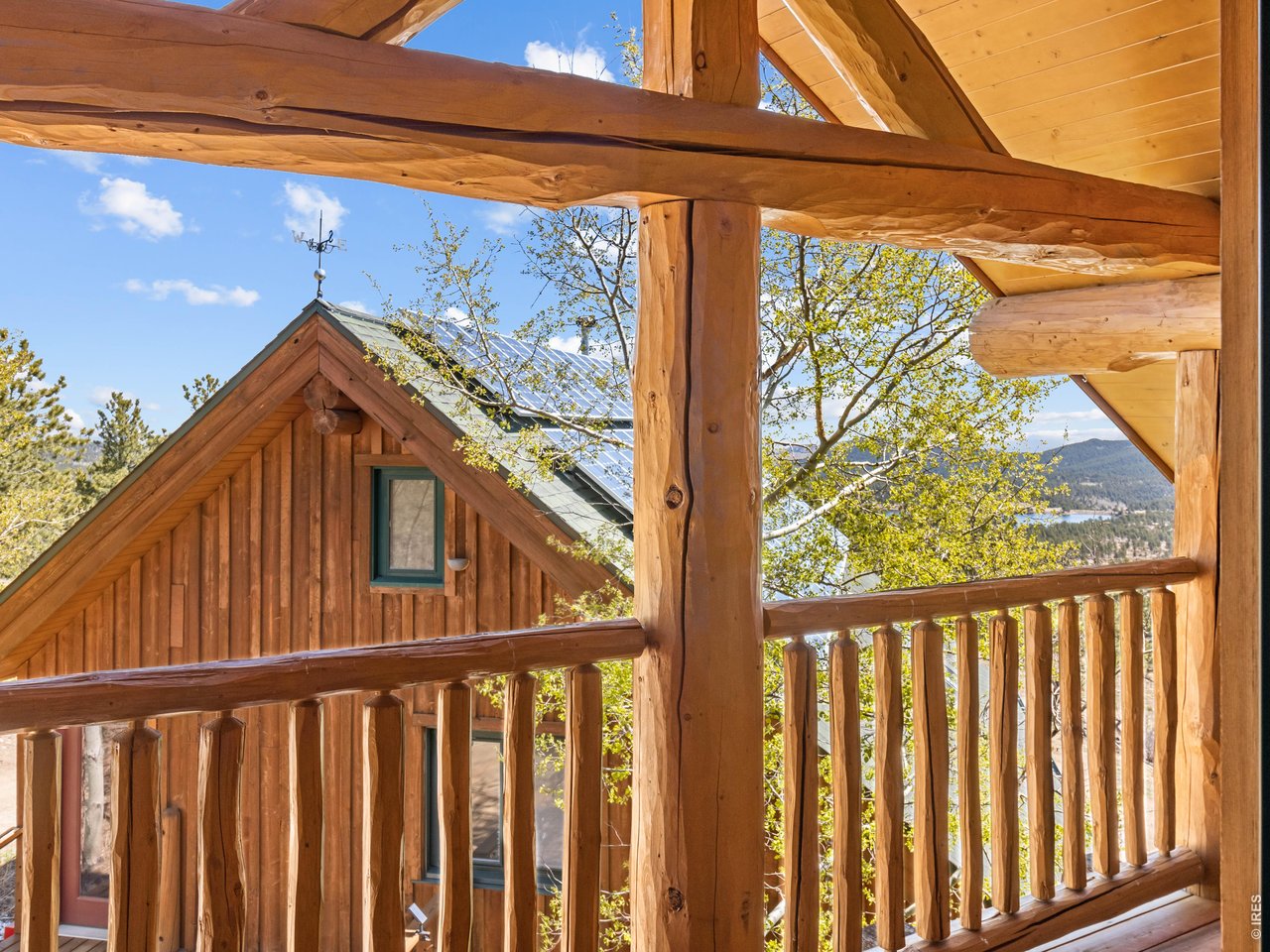 1398 Gold Lake Road Ward, CO 80481 - Photo 21 of 39 a view of outdoor space with deck and wooden floor