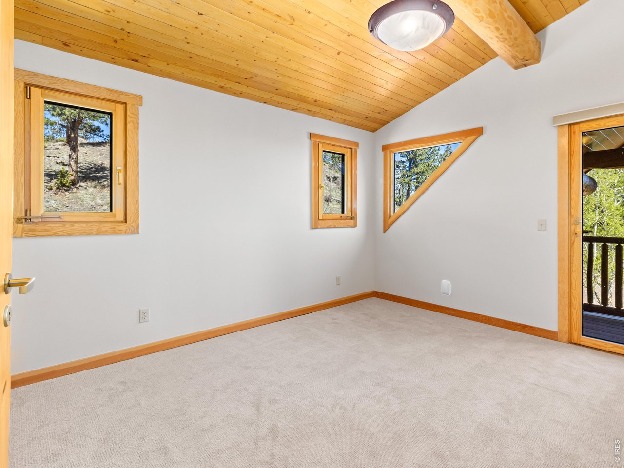 1398 Gold Lake Road Ward, CO 80481 - Photo 22 of 39 a view of an empty room with a window