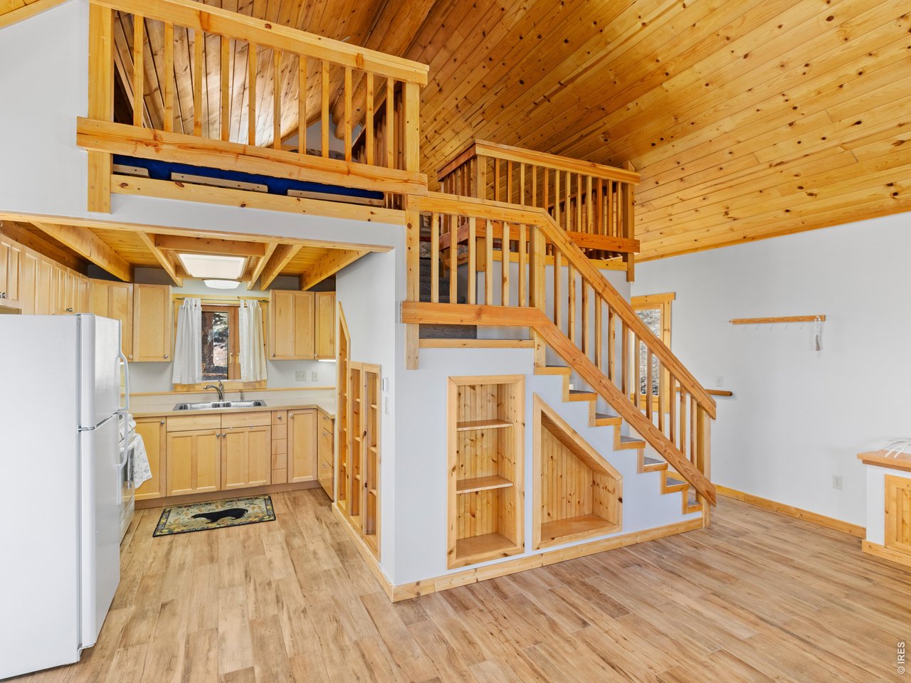 1398 Gold Lake Road Ward, CO 80481 - Photo 30 of 39 a view of an entryway with wooden floor