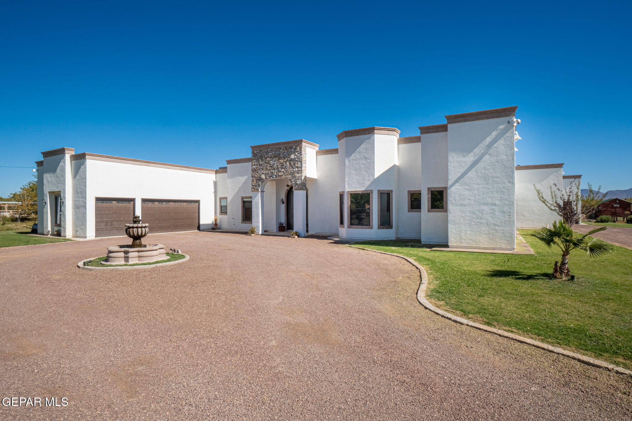 6750 Gato Road El Paso, TX 79932 - Photo 1 of 43 a view of a house with backyard and porch