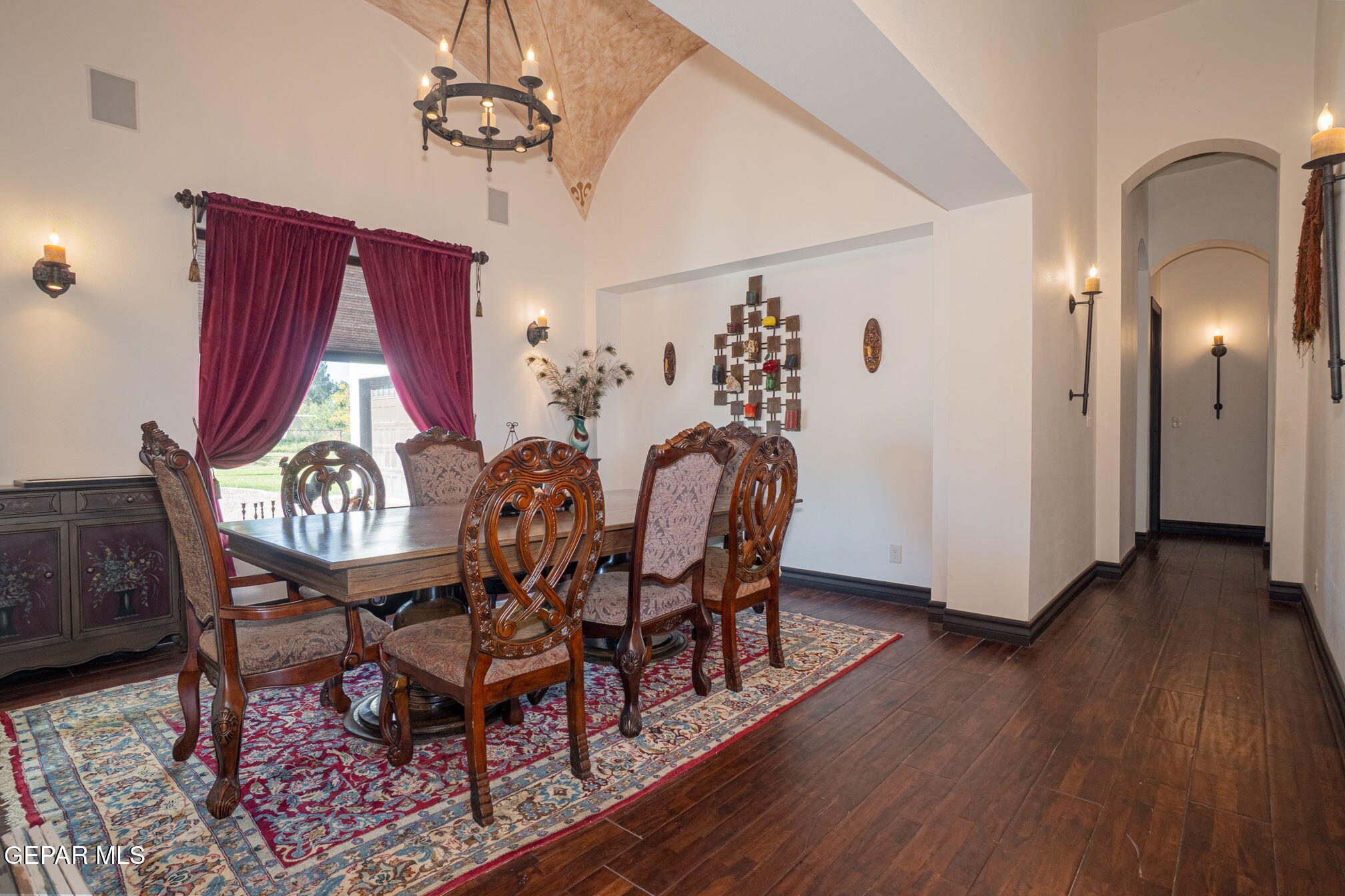 6750 Gato Road El Paso, TX 79932 - Photo 13 of 43 a view of a dining room with furniture window and wooden floor
