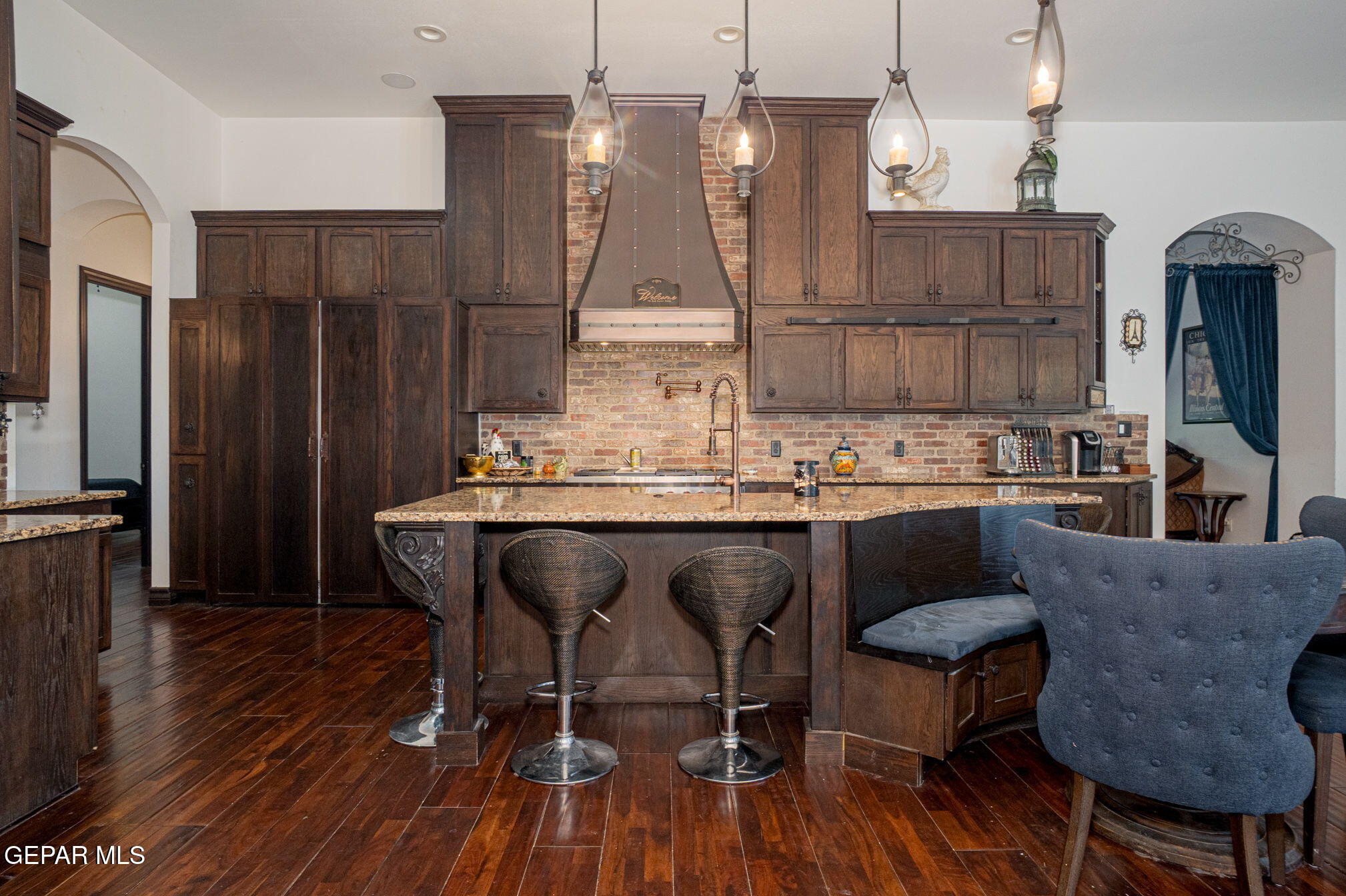 6750 Gato Road El Paso, TX 79932 - Photo 16 of 43 a dining room with furniture and wooden floor