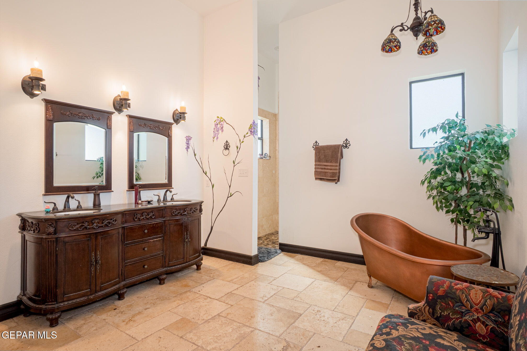 6750 Gato Road El Paso, TX 79932 - Photo 19 of 43 a living room with furniture and a potted plant