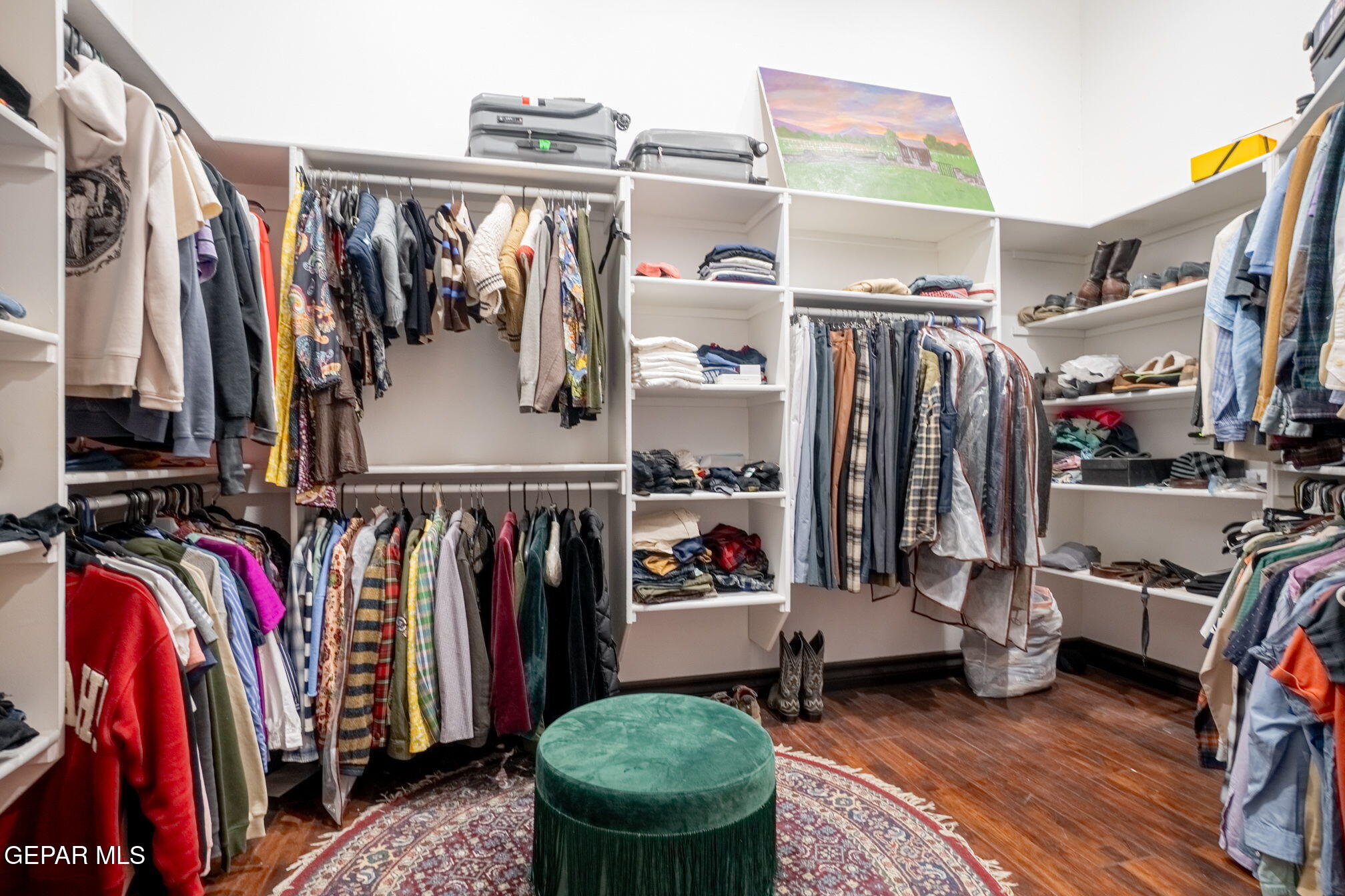 6750 Gato Road El Paso, TX 79932 - Photo 20 of 43 a view of walk in closet with clothes and shoes